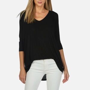 Nally & Millie Black V-Neck Relaxed Long Sleeve Top with a Flattering Cut